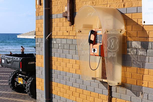 Public payphone of Bezeq telecom company in Haifa, Israel. Haifa is Israel's 3rd largest city.