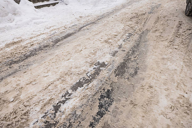Mountains of snow in city. Blizzard