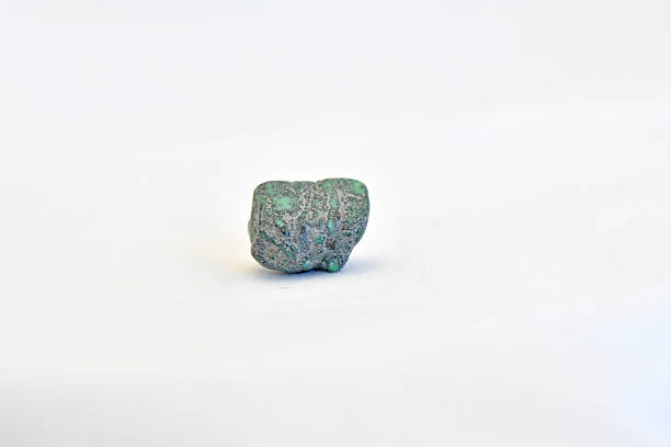 A pink rock covered in blue crystals, cgi