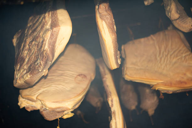 The first day of smoking, the early stage of drying the meat.
