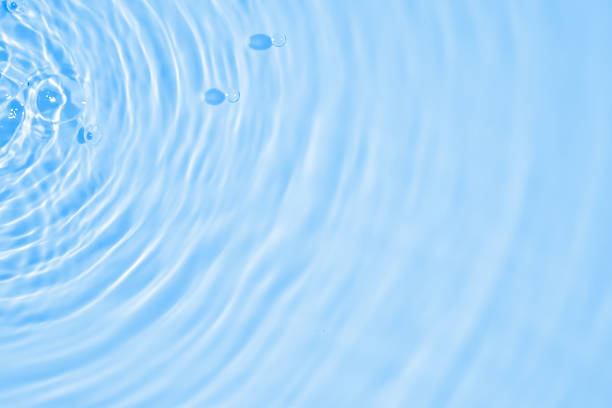 Abstract transparent water shadow surface texture natural ripple on blue background