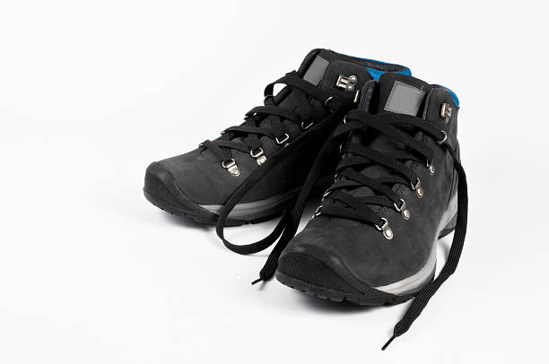 Formal black shoes pairing together isolated on white background close-up front view