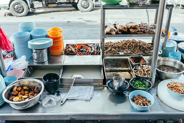Traditional Asian street food stand with street view background.Penang Island - Malaysia.