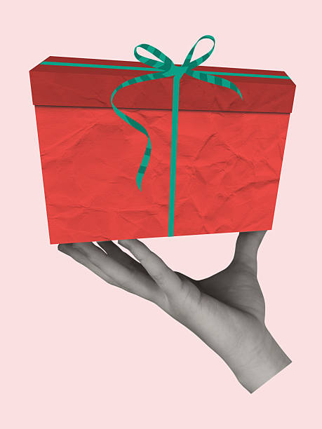 istock Contemporary art collage of hand with gift box. 2258688629