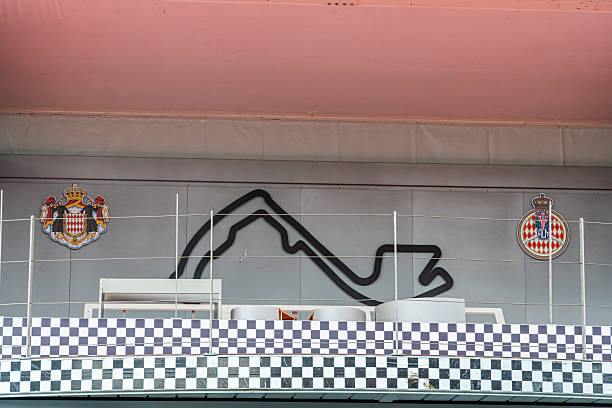 March 29, 2024. Monaco, Monaco. Formula 1 podium structure nearly completed on the Monaco street circuit, with fencing and event infrastructure installed weeks before the Grand Prix.