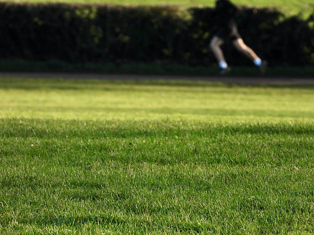 Fourteen-year-old girl running in the open air.