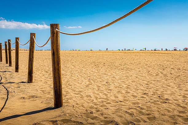 people at the beach at beautiful weather in Maspalomas at Grand Canary Island