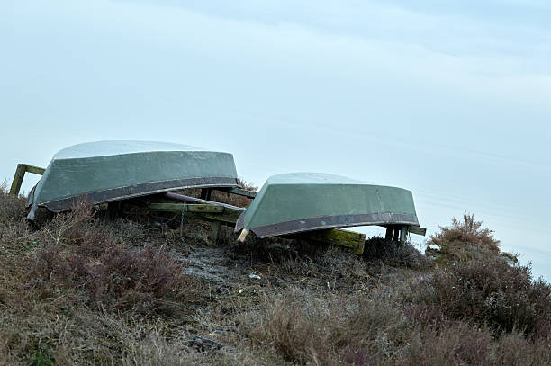 Views of huts and fishing boats in the Romagna lagoon