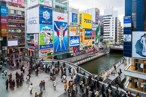 Crowd on Ebisubashi bridge at night, Dotonbori, Osaka, Japan