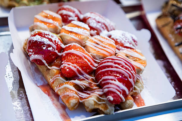Brussels waffles are iconic Belgian treats - popular with visitors to the city. The waffle here is decorated with sweet toppings.