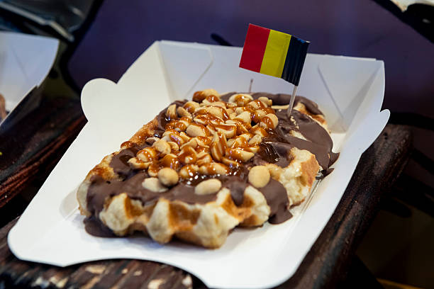 Brussels waffles are iconic Belgian treats - popular with visitors to the city. The waffle here is decorated with sweet toppings.