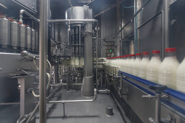 Bottles filled with ice tea on the factory production line