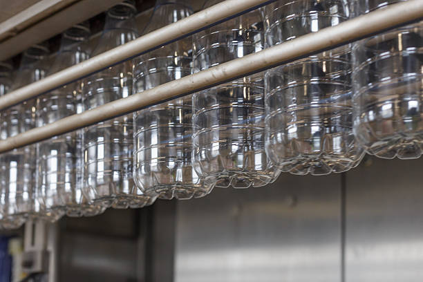 Bottling line in a milk plant. Special equipment of milk processing facility.