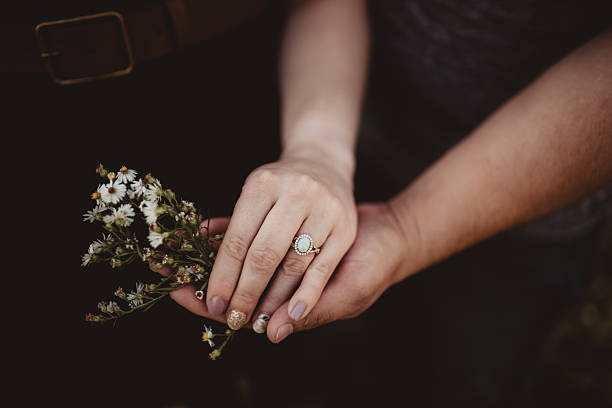 Vintage oval cut opal engagement ring with diamonds and flowers