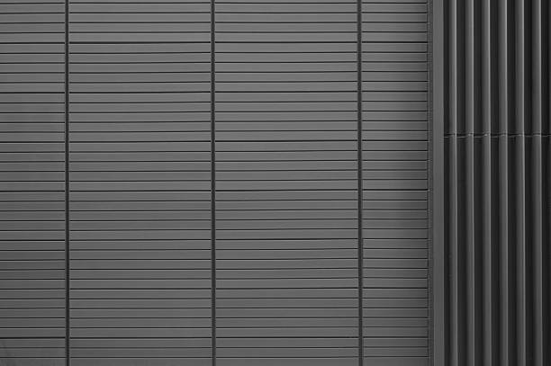 istock Gray corrugated metal wall texture background 2258797931