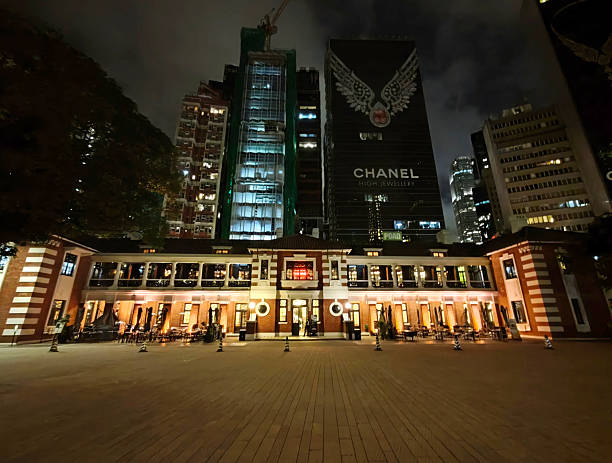 Tai Kwun square at night, the Former Central Police Station Compound which includes the former Central Police Station, the Former Central Magistracy and the Victoria Prison. The compound underwent a heritage revitalisation and reopened to the public on 29 May 2018.