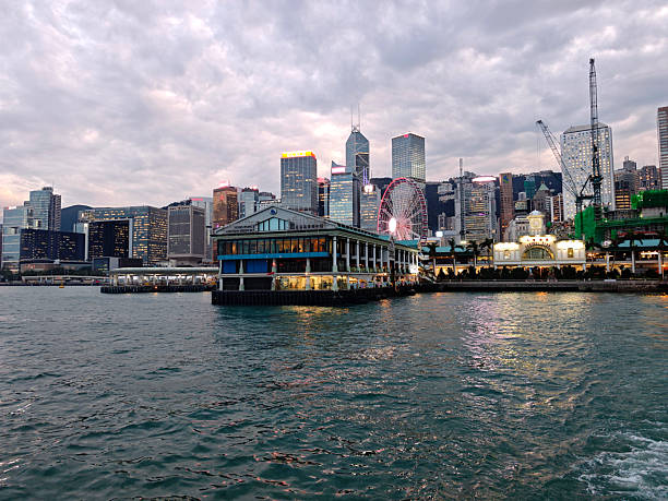 The Hong Kong skyline under the clouds at Central Ferry Pier.