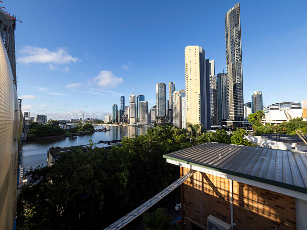 Upmarket houses and apartments on the banks of the Brisbane River at Yeronga, seen from Long Pocket