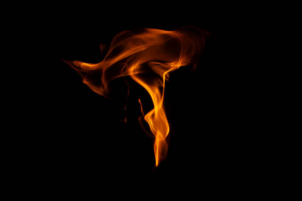 Decorative background with fire flames on black with copy space