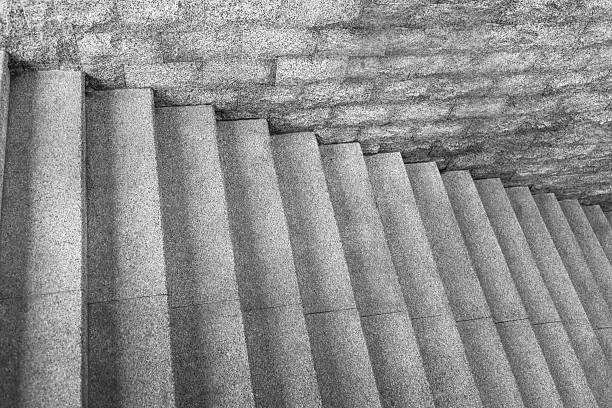 High angle view of empty marble stairs and wall