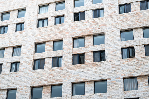 Modern apartment building with many glass windows