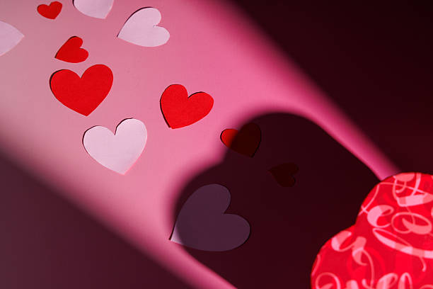 Minimalist pink background with a gift box. Perfect for social media posts, romantic branding and elegant love messages for the February holidays.