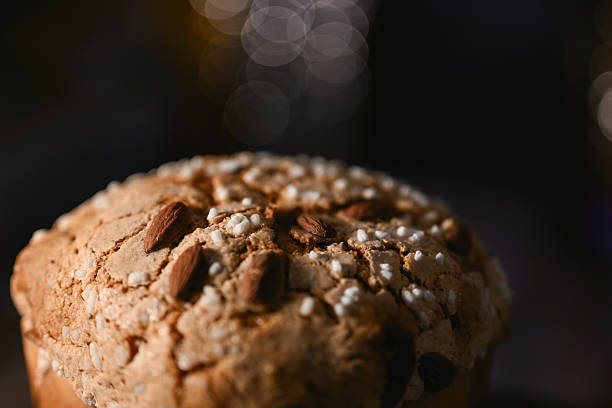 Panettone Italian Christmas cake with almonds and sugar sprinkles