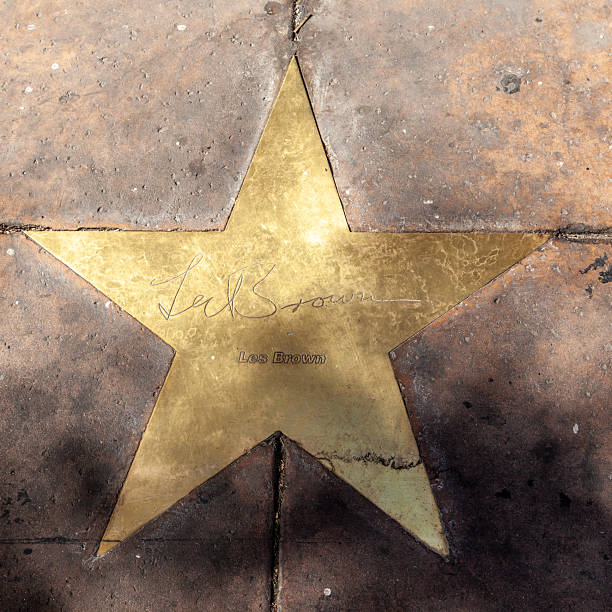 PHOENIX, USA - June 14, 2012: The name of stars like Les Brown in copper reflect the past glory of the Hotel San Carlos  in Phoenix, USA. The stars in the sidewalk were put in in 1993 to commemorate the visits of luminaries of their day.