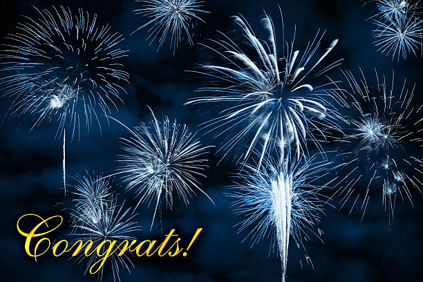 CONGRATS lettering with beautiful fireworks on a night blue sky background. Can be used as a congratulation holiday card / background / invitation / banner.