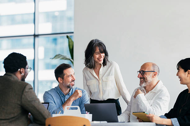 istock Smiling Team Meeting In Modern Office 2258933354