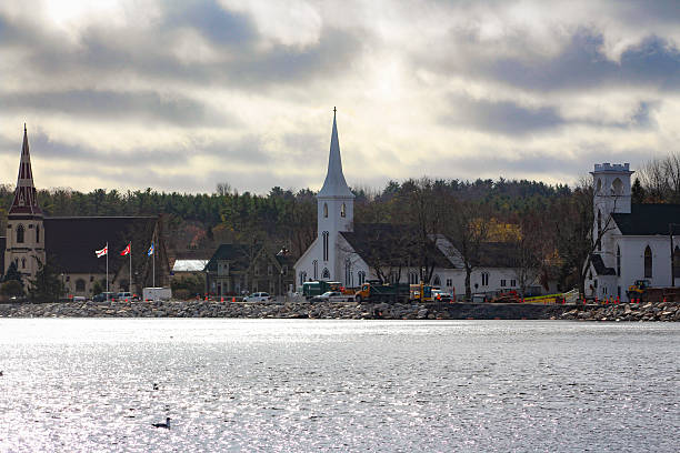 Mahone Bay, Nova Scotia, Canada - November 2025: The three churches of Mahone bay, a small fishing village in Nova Scotia, near the famous UNESCO heritage sight Lunenburg, from across the bay. Mahone Bay draws tourists due to it’s three picturesque churches.