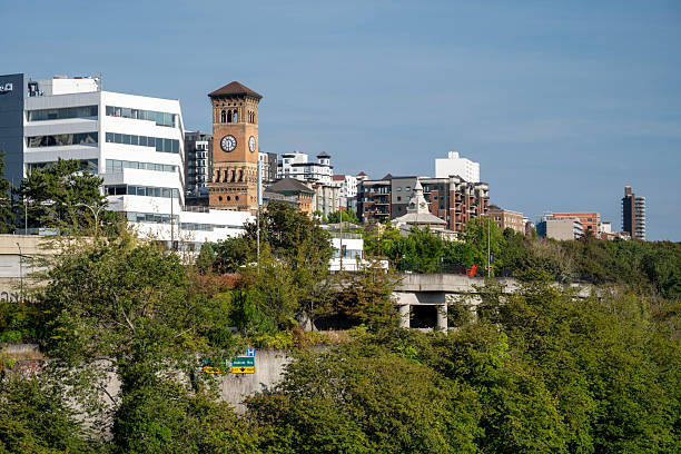 Spokane, WA, USA - May 1, 2025; Great Northern Clocktower reflecting in evening water of Spokane River