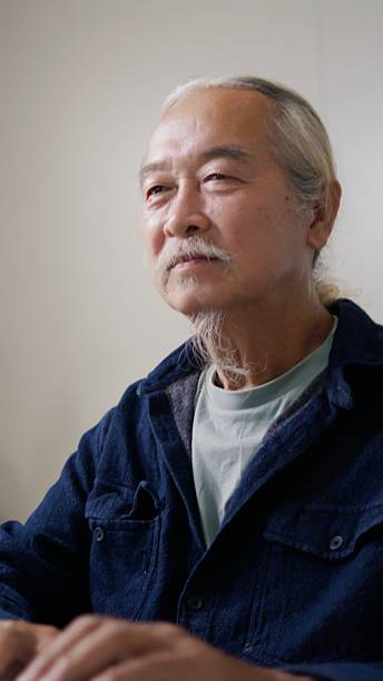 istock Senior Asian man using AI tools to learn about investment strategies for retirement. 2258974732