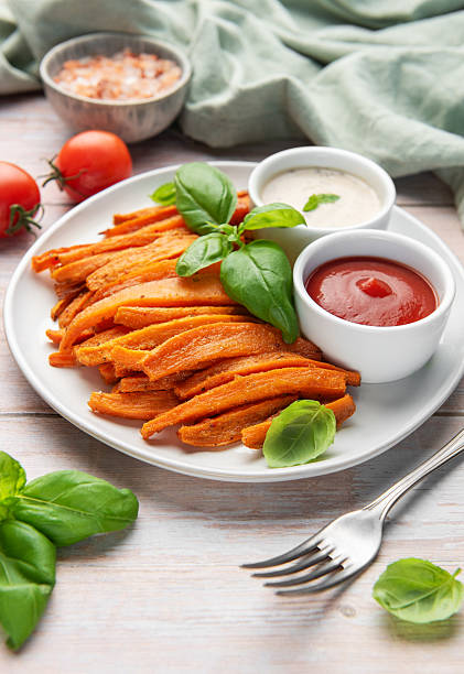 Sweet potato fries with ketchup and dipping sauce