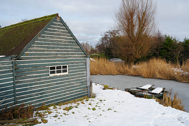 Ice fishing cabin on frozen Lake Saint Pierre by the Saint Lawrence River in Quebec.