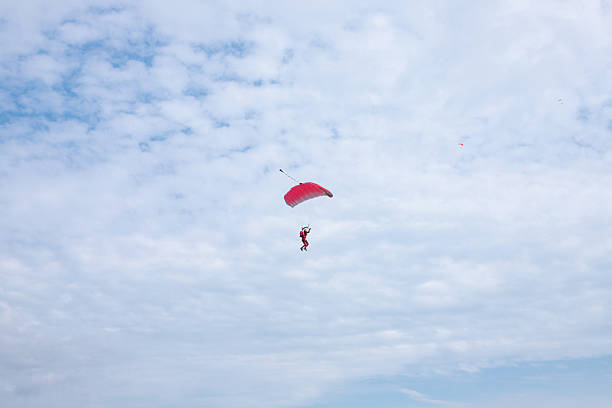 parachutists in the blue sky. High quality photo
