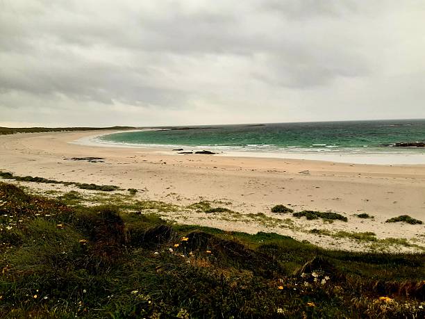 The beautiful white sands and clear turquoise waters of the Atlantic coast at Balranald Nature Reserve on the Isle of North Uist, Scotland.