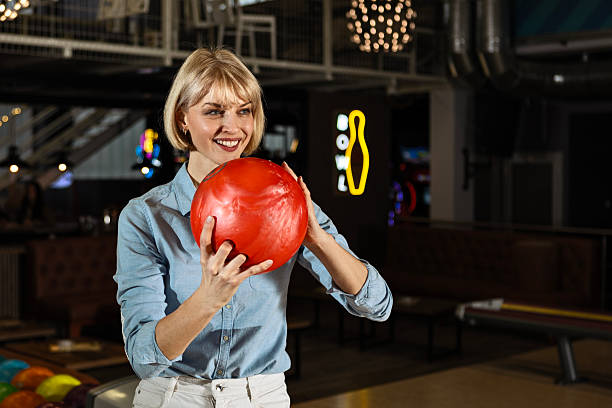 Women enjoying bowling