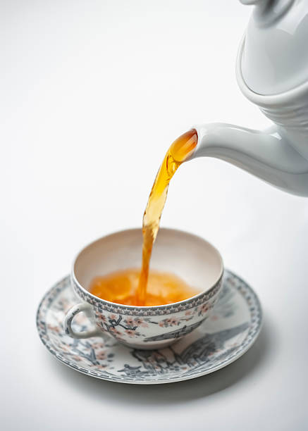 Hot drink black tea in a teacup