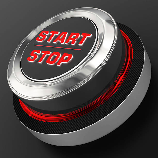 3d render. A high-gloss metal stop-start button with bold red text and layered chrome rings. Evokes technology, control interfaces, and industrial design for tech, automotive, or electronics themes.