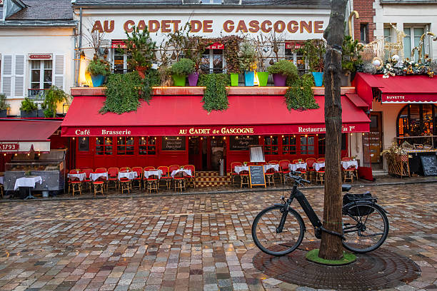 Paris, France - January 27th 2026: Beautiful exterior of the restaurant Au Cadet de Gascogne on Place du Tertre in the Montmartre quarter of Paris in France.