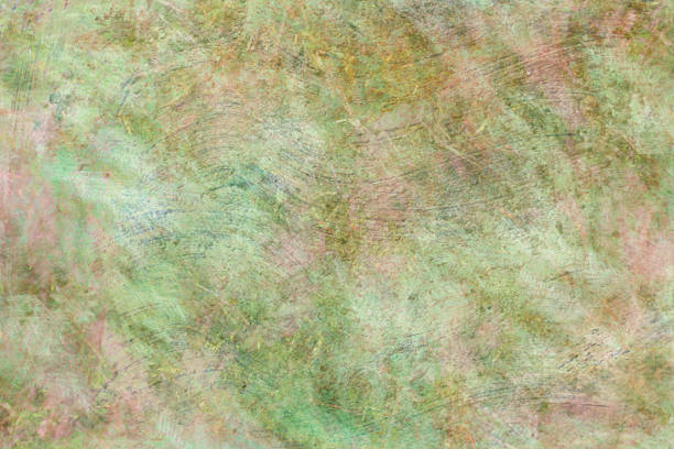 Blurred botanical background texture with light greens and pinks.