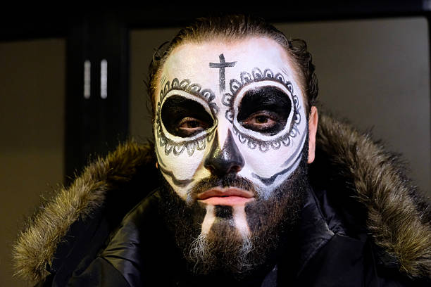 Soho, London.  November 1st 2025.  A man in the street with scary facepaint after midnight on Halloween in Soho, London.