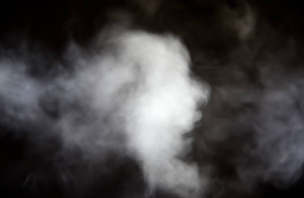 Steam rising on a black background