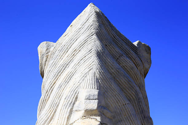 benidorm spain july  28 \n 2023  Dama de Elche is an Iberian bust carved in limestone dating from 500-300 BC. found near the city of Elche in Spain. and it stands in a park in the city of benidorm and the bust is a copy and there are a few everywhere in spain and it symbolizes the origin of the spanish.