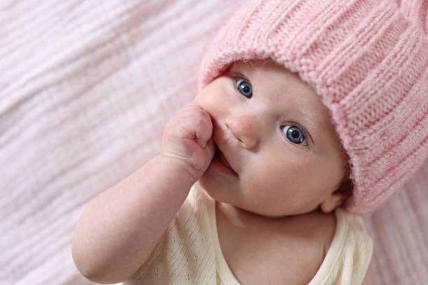 Portrait of a cute little baby girl on the bed - Buenos Aires - Argentina