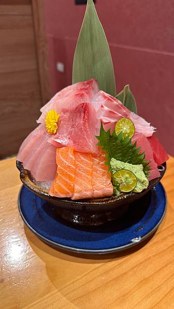 Vibrant Kaisendon Dish Overflowing with Various Raw Fish and Shellfish Delicacies Served Over Rice