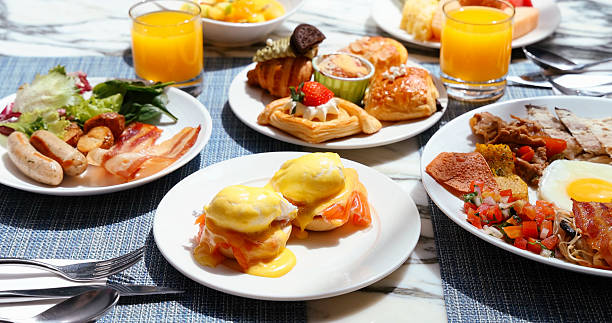 Luxury breakfast spread with eggs benedict
