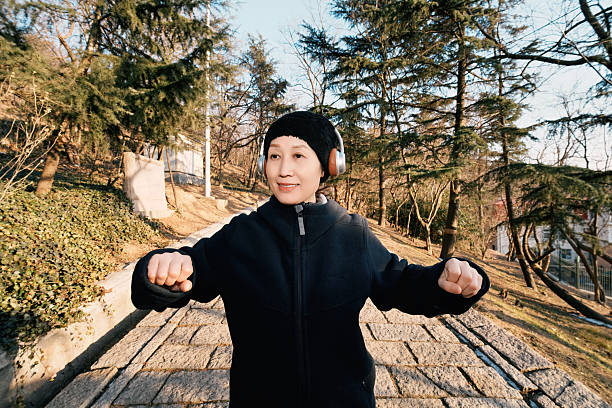 Young Person Using Smartwatch Outdoors