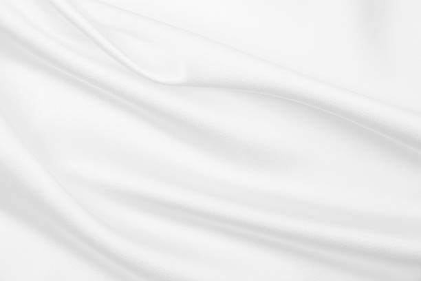 istock Smooth elegant white silk or satin luxury cloth texture as wedding background. Luxurious background design 2259221409